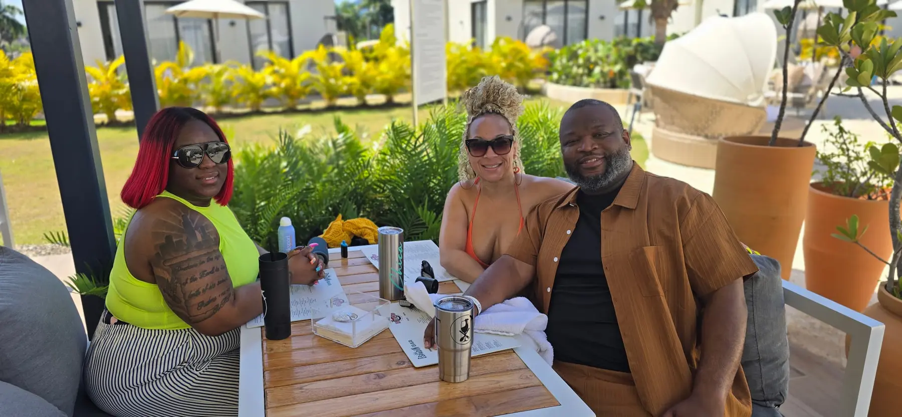 Passport Collective travelers seated together at a resort restaurant